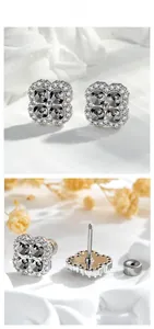 Detailed macro view of four-leaf clover stud earrings with pavé set cubic zirconia stones