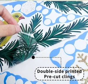 Close-up of double-side printed snowflake window clings with easy pre-cut peel design