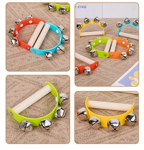 Close-up of colorful wooden hand bells with metal rattles for baby sensory play