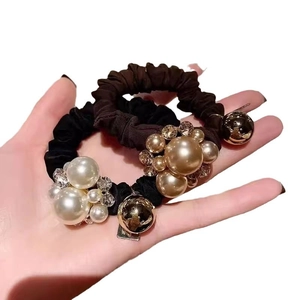 Elegant pearl and rhinestone hair scrunchies set in black and dark brown fabric