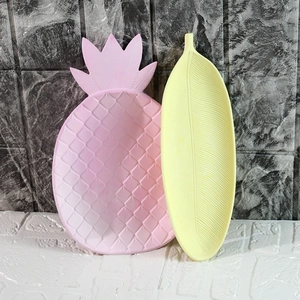 Détails du plateau ananas en silicone et tapis feuille avec texture gaufrée