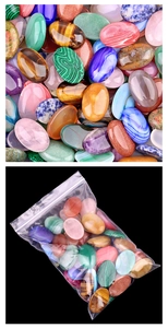 Macro detail of mixed oval gemstone cabochons with high polish finish for DIY jewelry