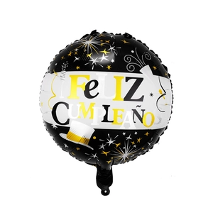 Detailed view of an 18-inch round black and gold Spanish Feliz Cumpleaños foil balloon