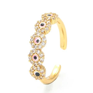 Adjustable gold flower ring with pink evil eye enamel and sparkling cubic zirconia