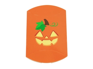 Detail of orange pumpkin pillow box for Halloween candy with Jack-o'-lantern face