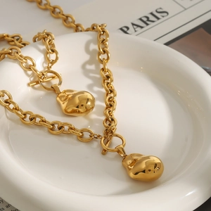 Bracciale in acciaio inossidabile placcato oro 18K con ciondolo a goccia e chiusura a levetta