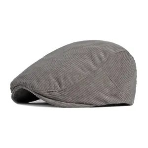 Classic grey corduroy flat cap for men and women with vintage newsboy style aesthetic