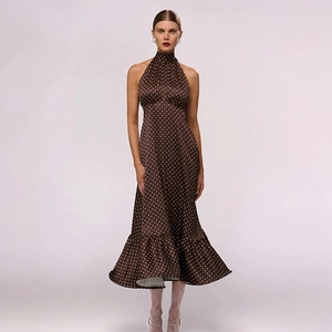 Elegant dark brown polka dot halter dress with ruffle hem and backless satin finish
