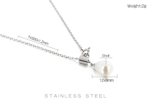 Detailed macro view showing teardrop shell pendant and stainless steel chain dimensions