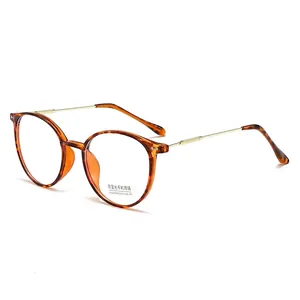 Retro round tortoise blue light glasses with gold metal temples and UV400 protection