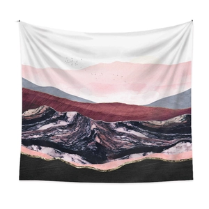 Detailed texture of mountain tapestry with abstract pink and gold marble patterns