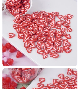 Detailed view of realistic strawberry polymer clay slices for DIY crafts and slime filler