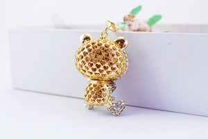Close-up of creative panda keychain with sparkling rhinestones and bamboo design detail
