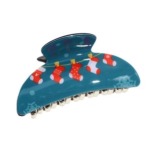 Deep teal semi-circle hair claw clip with Christmas stockings pattern on white background