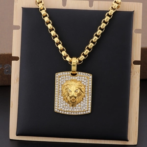Detail of hip hop gold lion head pendant with micro-paved rhinestones on black stand