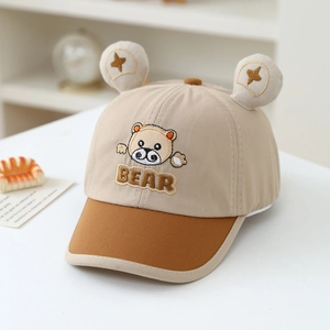 Detail of khaki kids baseball cap with 3D bear ears and embroidered BEAR lettering