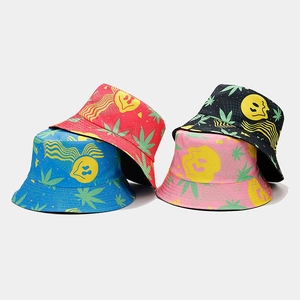 Detail view of four patterned bucket hats in blue, red, pink, and black colors