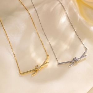 Elegant gold and silver titanium steel knotted necklaces with sparkling zircon inlay