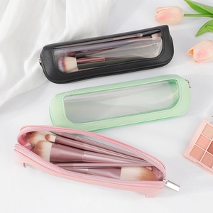 Detailed view of portable PU makeup brush pouches with clear windows in three colors