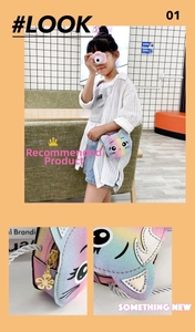 Detailed view of rainbow glitter cat shoulder bag with floral zipper and rope strap