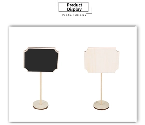 Detail of mini wooden chalkboards with wavy edges and round base for party decor