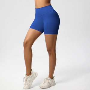 Side view of royal blue seamless high waist yoga shorts with wide tummy control waistband