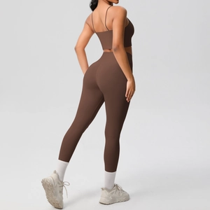 Detail view of deep brown double-sided brushed yoga set with cross-back sports bra and leggings