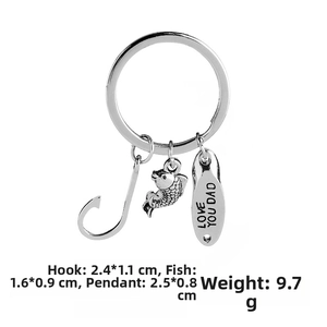 Detail of silver keyring featuring Love You Dad engraving and textured fish charm