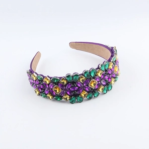 Detailed view of Baroque headband with colorful rhinestones and purple fabric lining
