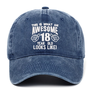 Detail of washed blue cotton baseball cap with 18th birthday embroidery text