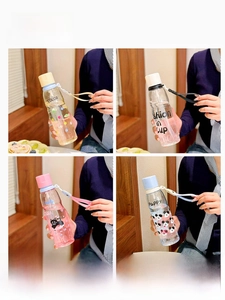 Collage of four colorful cartoon plastic cups with portable lids and cute animal patterns