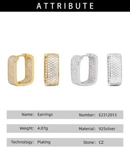 Detail view of U-shaped square silver earrings with cubic zirconia and 925 hallmarks