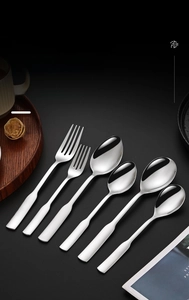 Detailed close-up of SUS304 stainless steel square handle spoons and forks with mirror finish