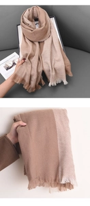 Detail of camel and beige cashmere-feel scarf with fringe and diagonal texture
