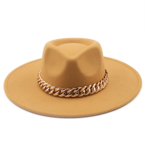 Detail of camel wide brim wool fedora hat featuring a stylish thick gold chain decoration