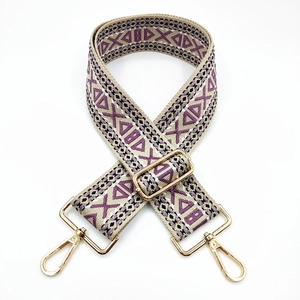 Bohemian wide bag strap with purple and black geometric woven patterns and gold metal clips
