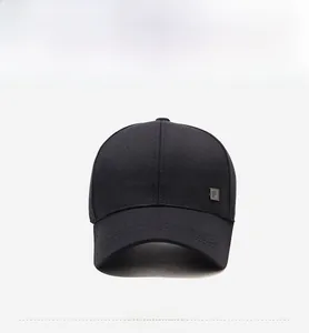 Front view of black cotton baseball cap with grey square F logo patch on textured fabric