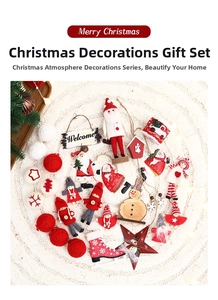 Close-up of assorted red and white Christmas ornaments including Santa dolls and stars