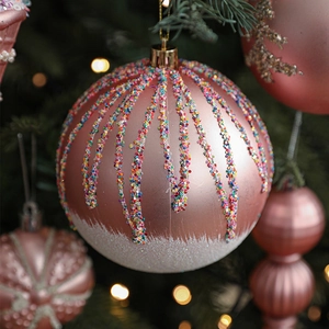 Pink Christmas ornaments with rose gold finish and iridescent glitter dripping texture