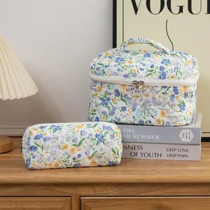 Quilted floral makeup bag set with cute bunny print on wooden table with elegant decor