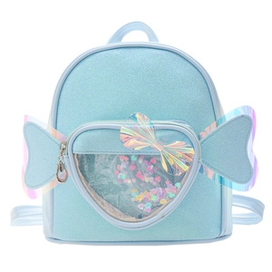 Sparkly light blue girls backpack with iridescent wings and sequin heart window