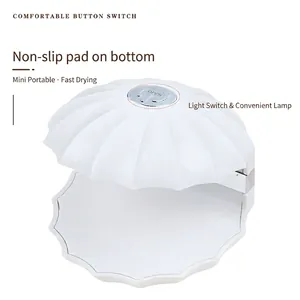 Lámpara de uñas UV LED portátil con forma de concha blanca y función de secado rápido