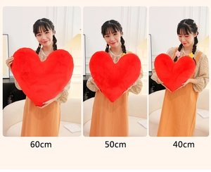 Three sizes of red heart plush pillows displayed in 40cm, 50cm, and 60cm comparison