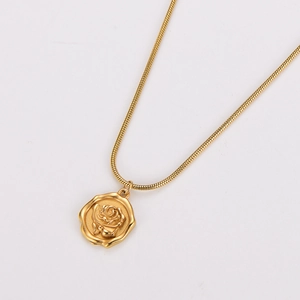 Vintage gold stainless steel necklace with embossed rose pendant on a snake chain