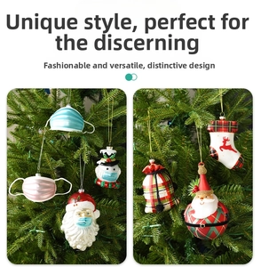 Detail of unique medical mask Santa and snowman ornaments hanging on a Christmas tree