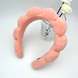 Thick coral pink sponge headband for skincare with soft microfiber wave design