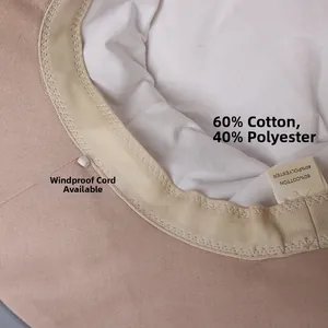 Macro detail of breathable cotton linen sun hat interior with windproof rope hook