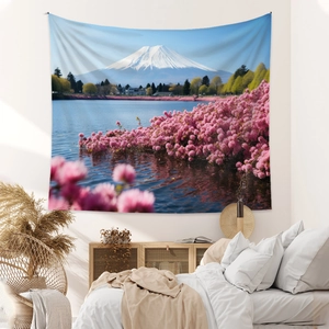 Close-up of Mount Fuji tapestry with pink cherry blossoms in a cozy bedroom setting