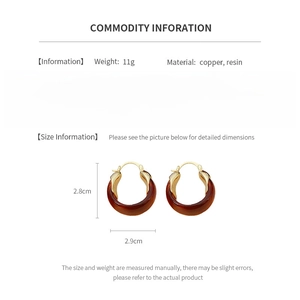 Detailed spec sheet showing dimensions and materials for the gold-plated brown resin hoops