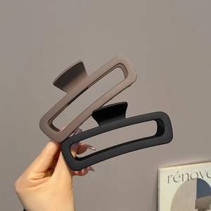 Matte rectangular claw clips in khaki and black for thick hair styling, set of two